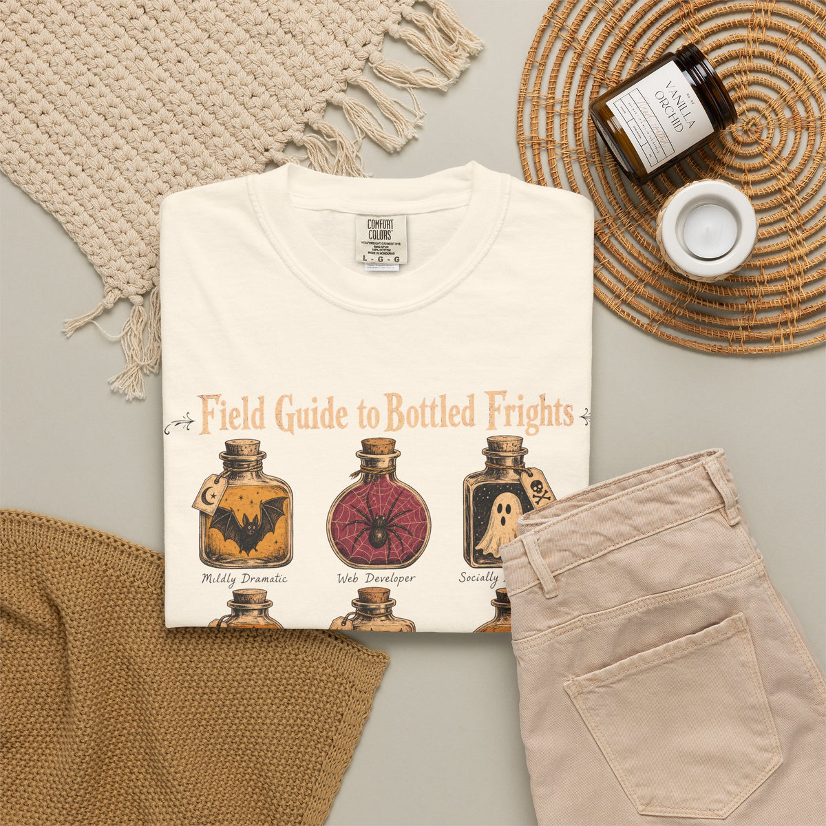 Field Guide to Bottled Frights T-shirt in Ivory, flat lay view