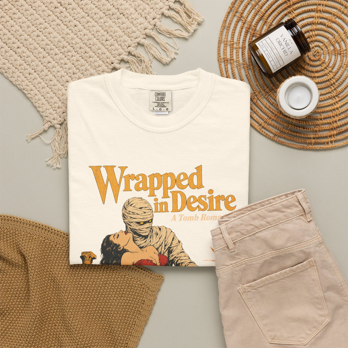 Wrapped in Desire Mummy Romance Novel T-shirt in Ivory, flat lay view
