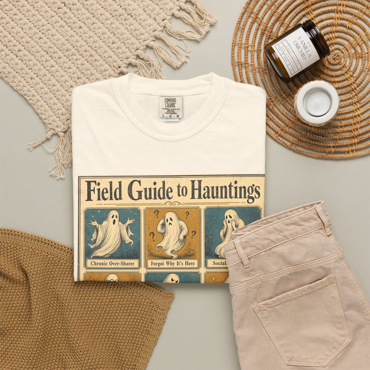 Field Guide to Hauntings T-shirt in Ivory, flat lay view