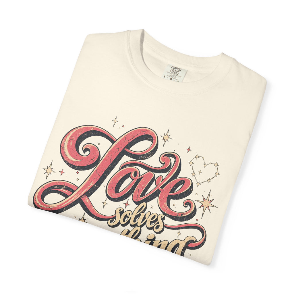 Love Solves Everything T-shirt in Ivory, folded view