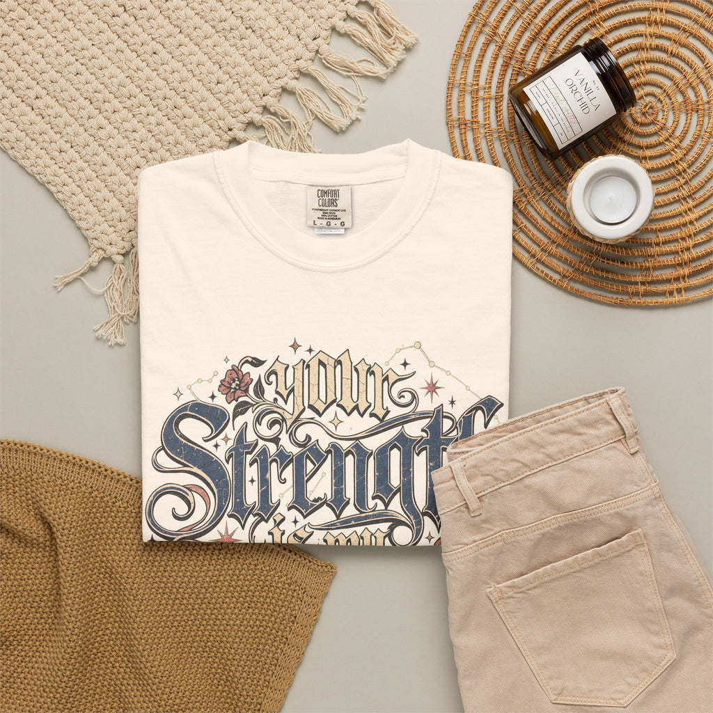 Your Strength Is My Weakness T-shirt in Ivory, flat lay view