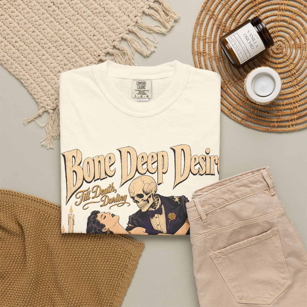 Bone Deep Desire Skeleton Romance Novel T-shirt in Ivory, flat lay view