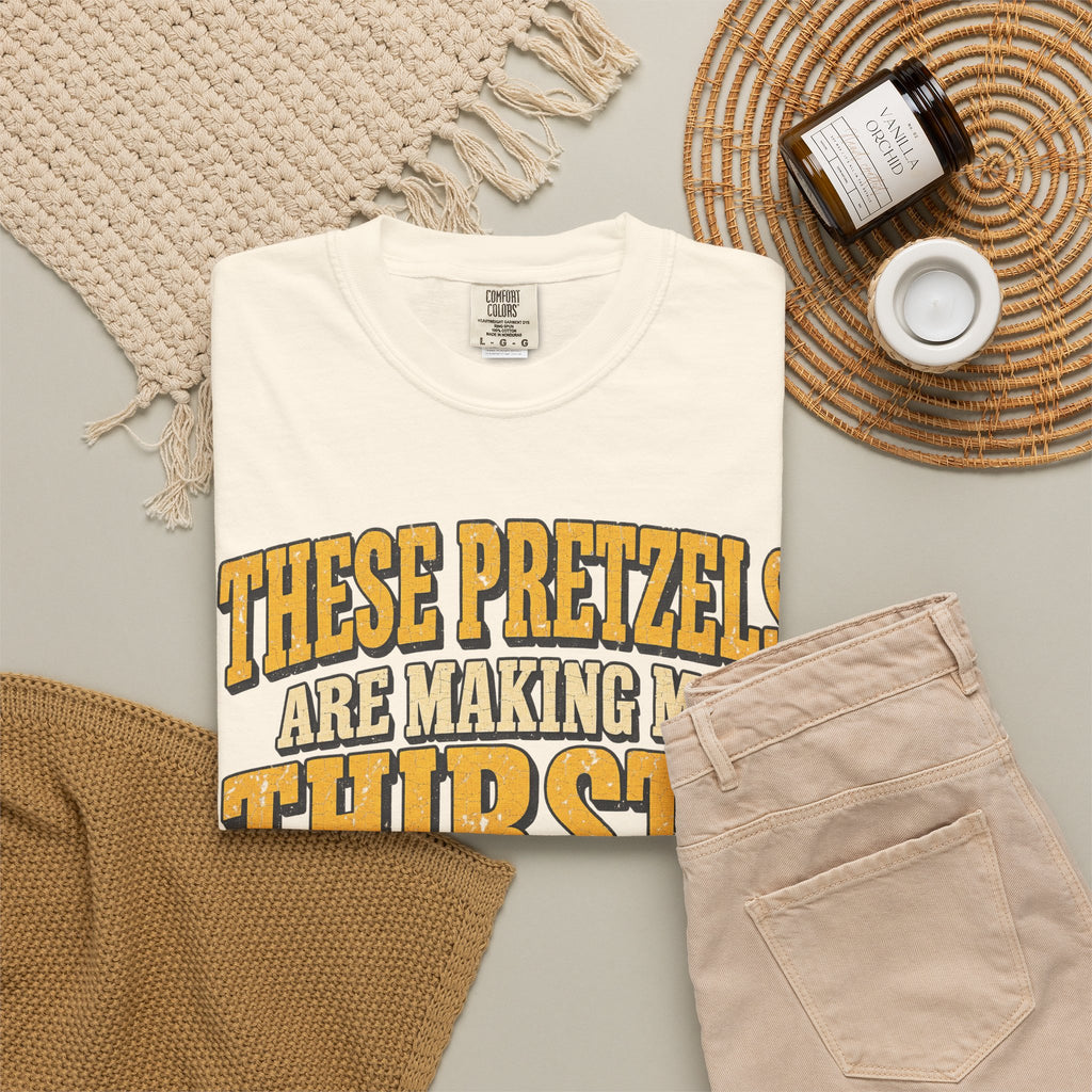 These Pretzels Are Making Me Thirsty T-shirt in Ivory, flat lay view