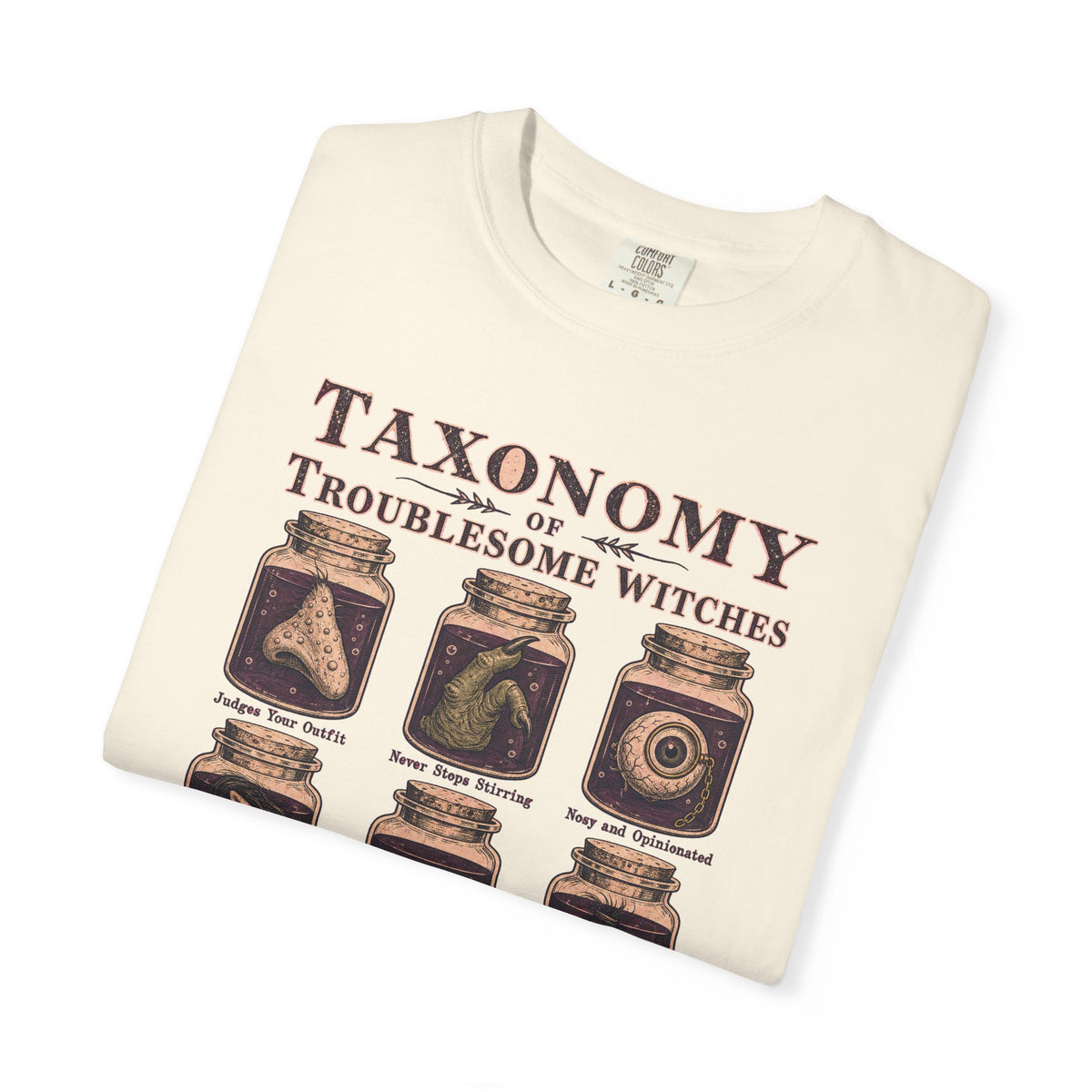 Taxonomy of Troublesome Witches T-shirt in Ivory, folded view