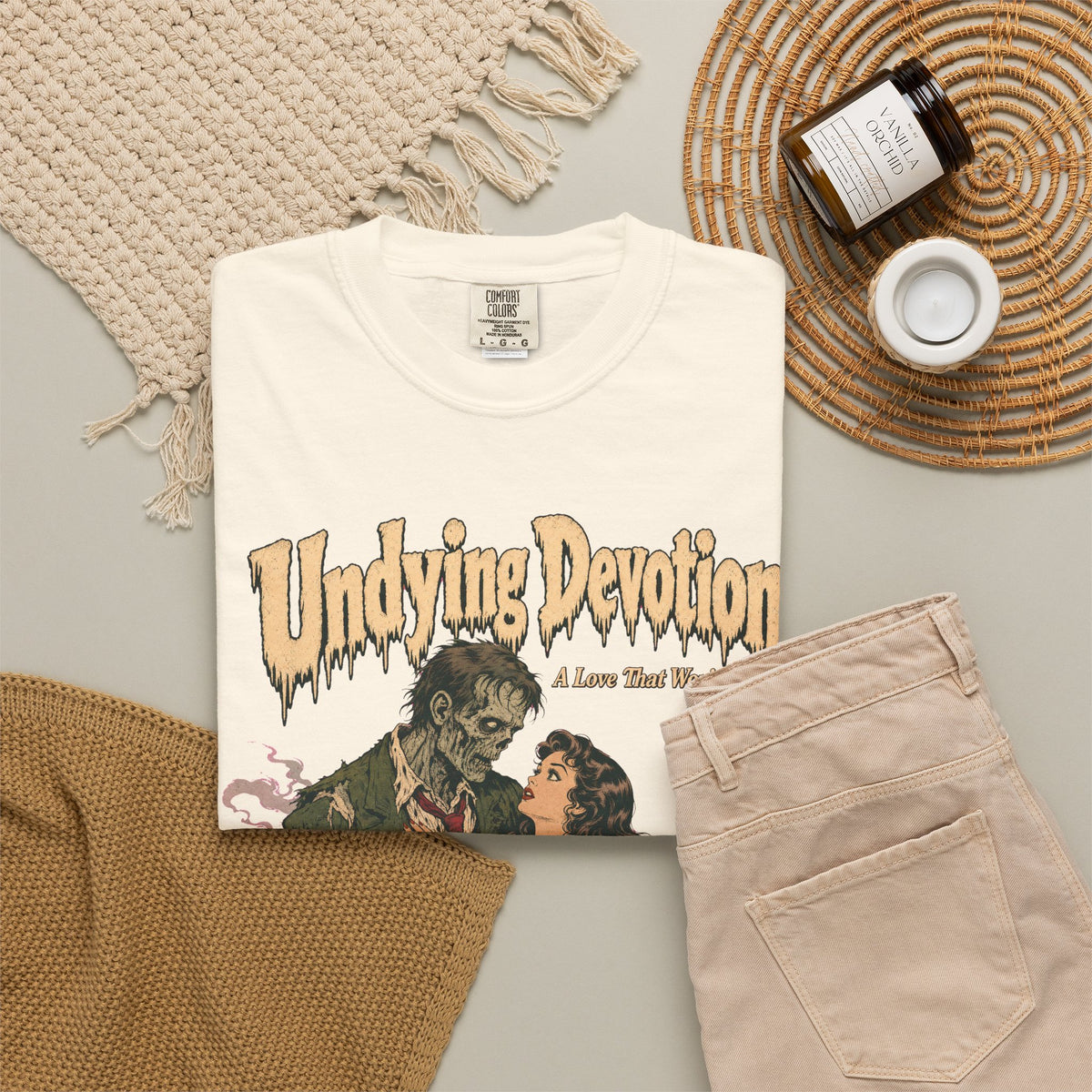 Undying Devotion Zombie Romance Novel T-shirt in Ivory, flat lay view