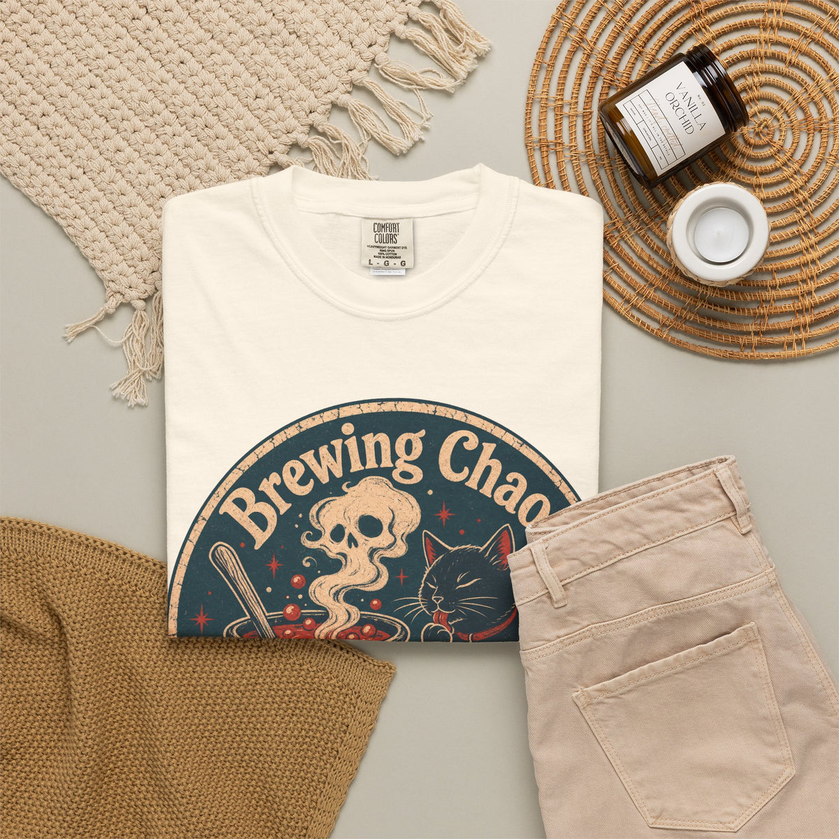 Brewing Chaos T-shirt in Ivory, flat lay view