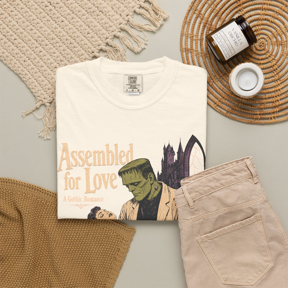 Assembled for Love Frankenstein Romance Novel T-shirt in Ivory, flat lay view