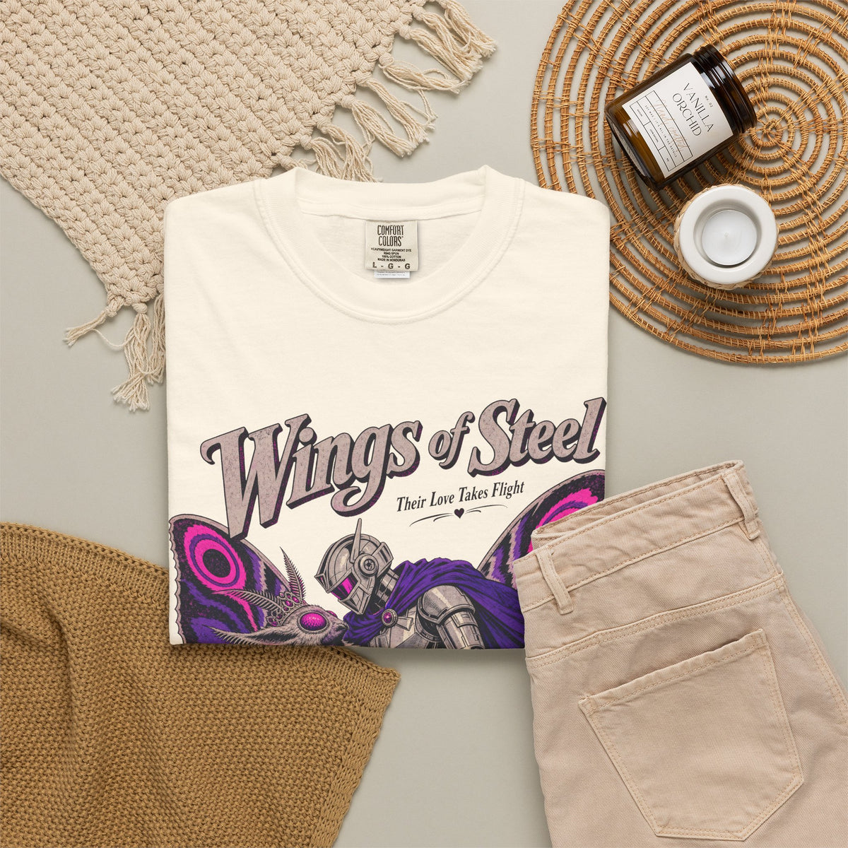 Wings of Steel Romance Novel Parody T-shirt in Ivory, flat lay view