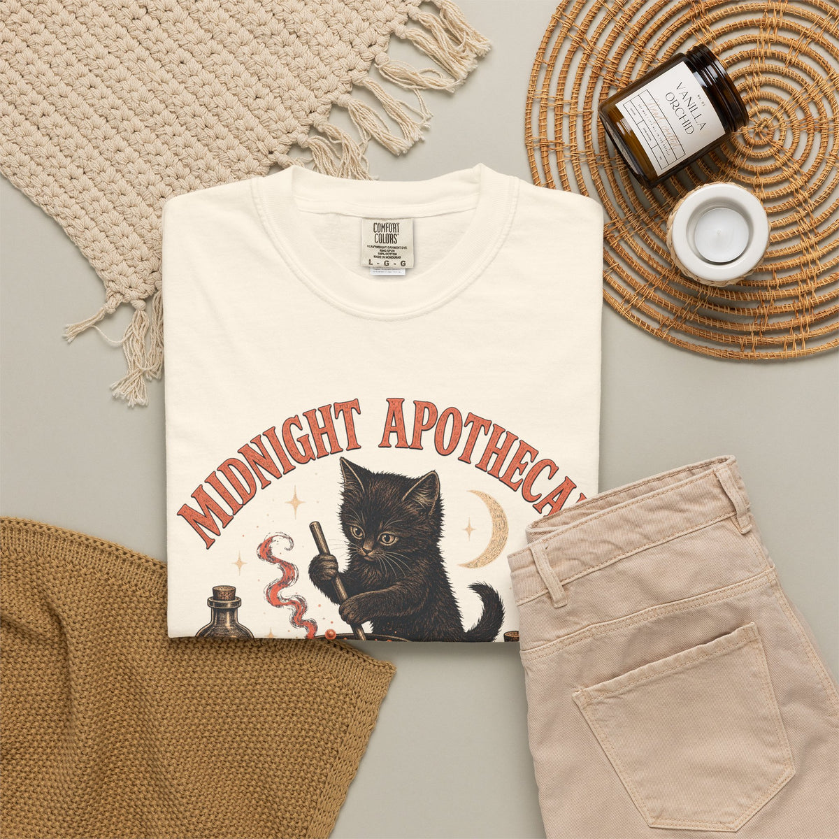 Black Cat Apothecary T-shirt in Ivory, flat lay view